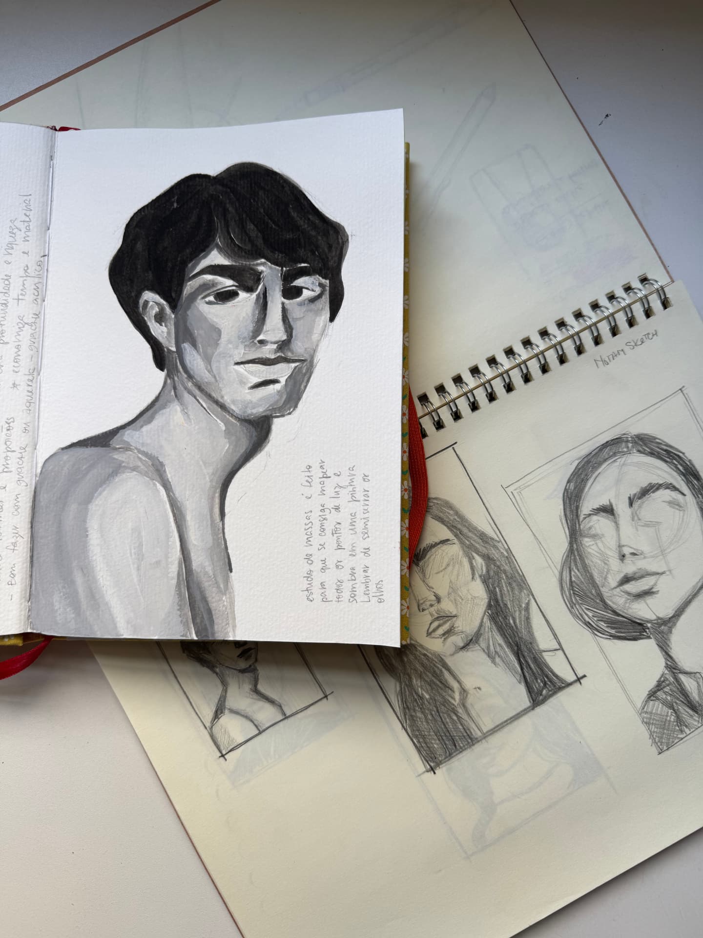 Estudos de retrato em caderno com guache e grafite